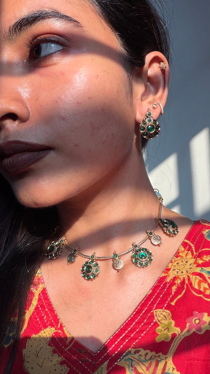 Kemp with coin necklace