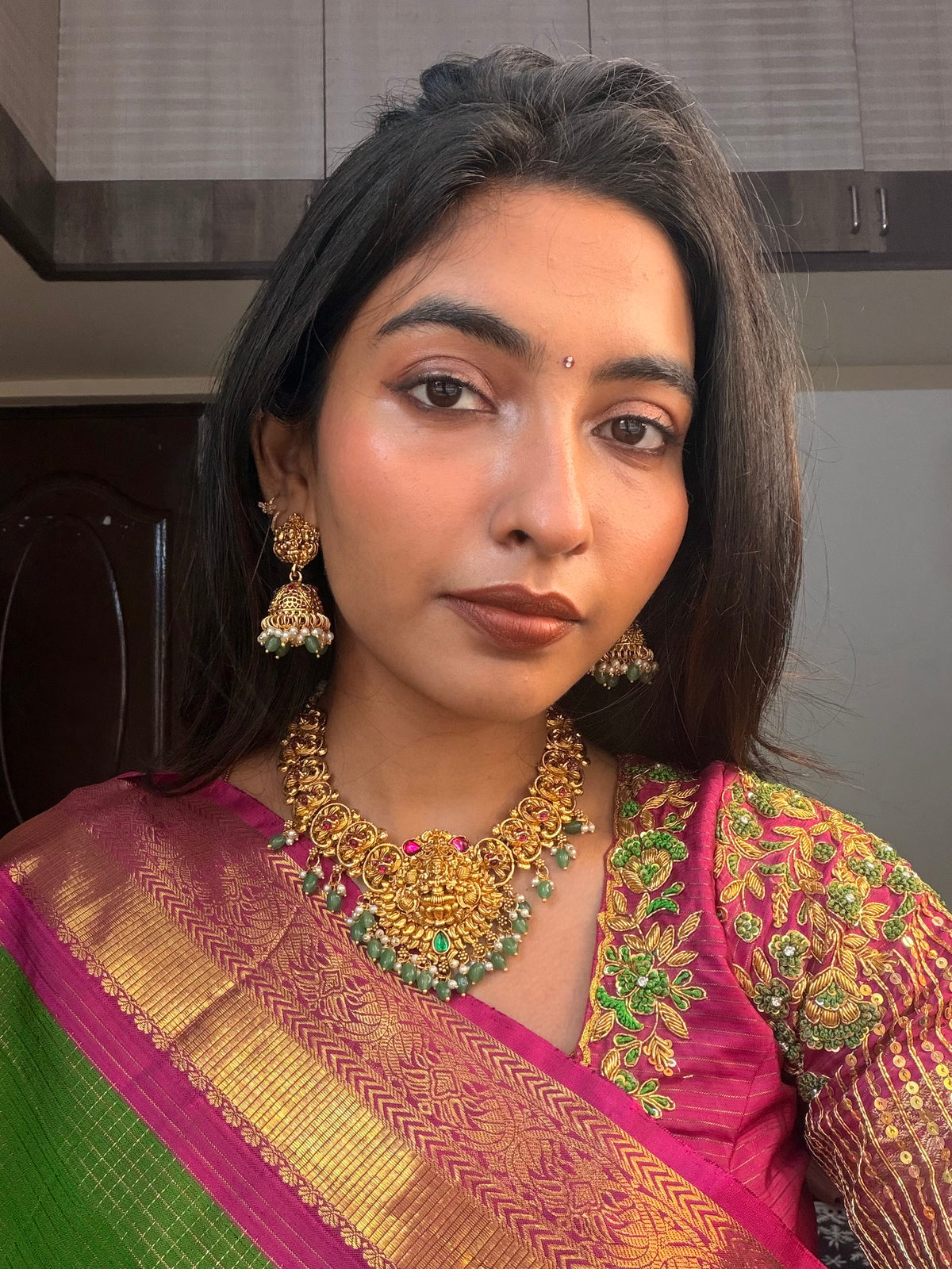 Lakshmi with pink Kundan necklace