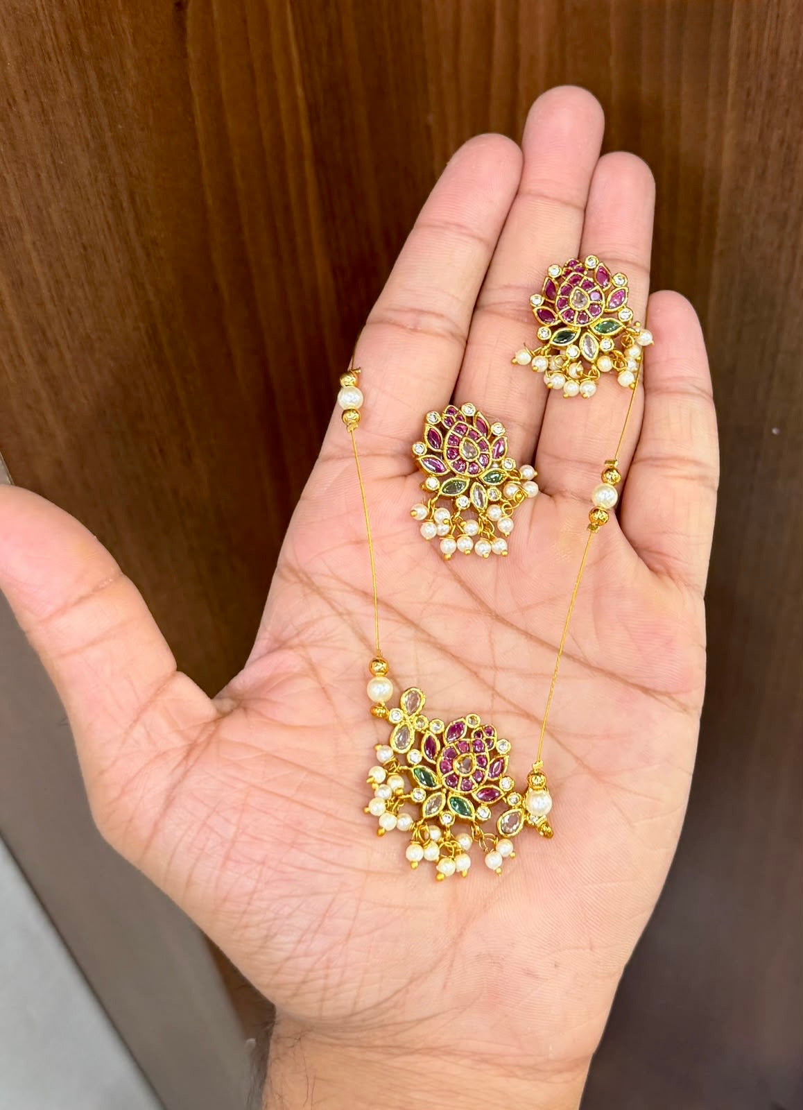 Invisible chain with lotus pendant