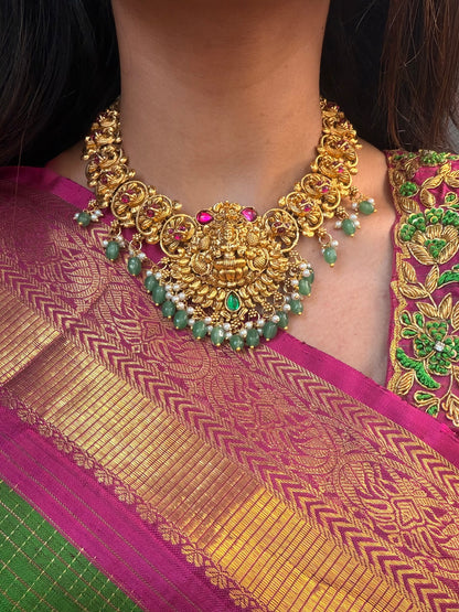 Lakshmi with pink Kundan necklace
